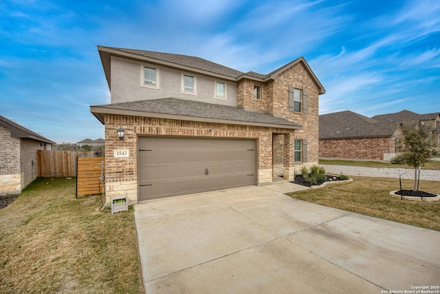 view of front facade featuring a front yard and a garage