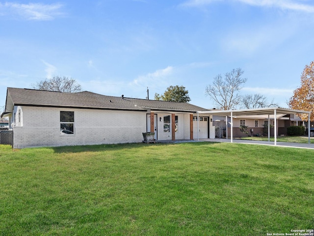 ranch-style home with a front yard and a carport