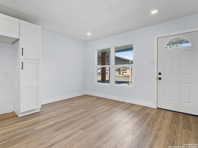 foyer entrance featuring light hardwood / wood-style flooring