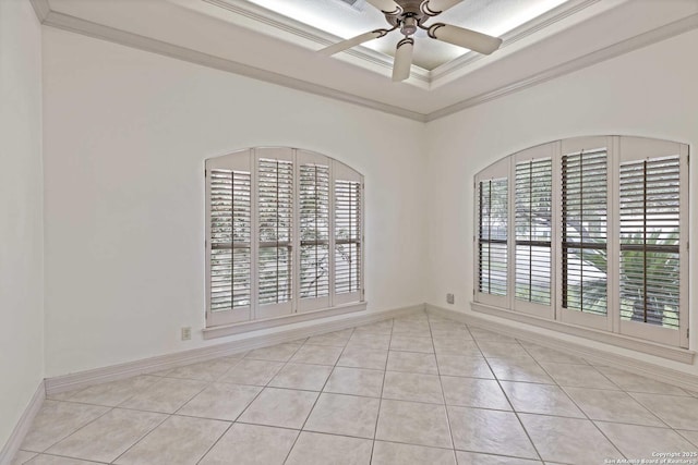 empty room with light tile patterned floors, ceiling fan, crown molding, and plenty of natural light