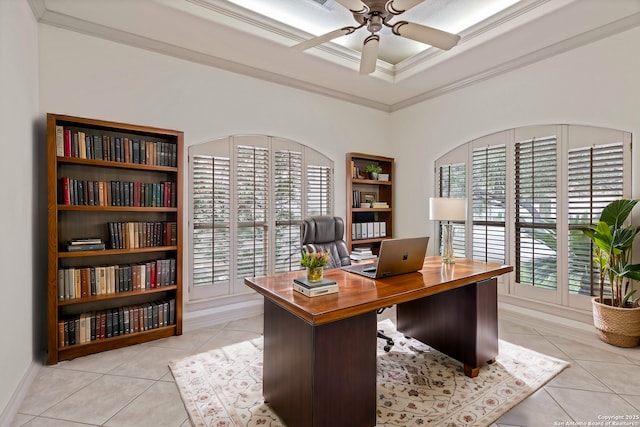 office area with ceiling fan, crown molding, and light tile patterned floors