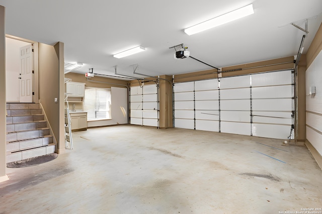 garage featuring a garage door opener