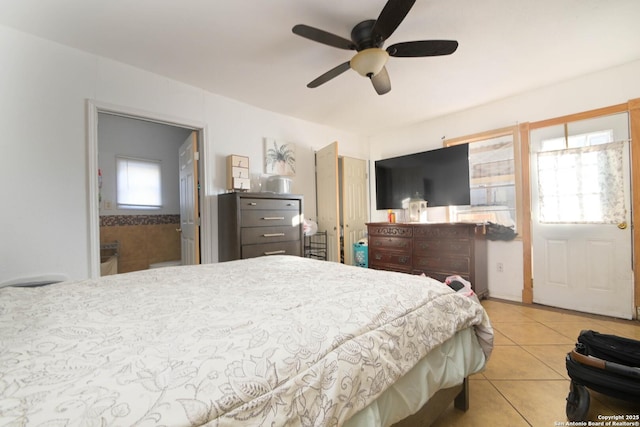 bedroom featuring ceiling fan and light tile patterned flooring