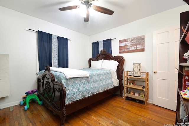 bedroom featuring ceiling fan and wood-type flooring