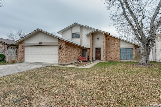 view of front of home featuring a garage and a front lawn