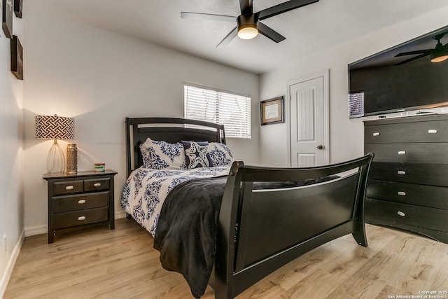 bedroom featuring ceiling fan and light hardwood / wood-style floors