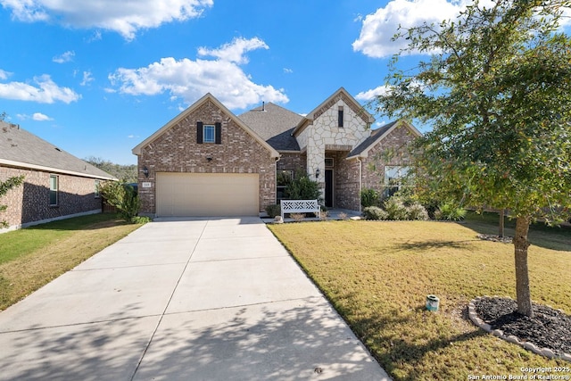 view of front of house with a front lawn and a garage