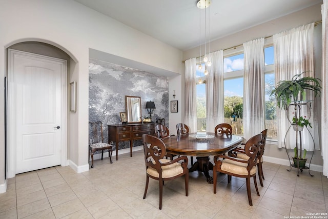 dining room featuring light tile patterned floors