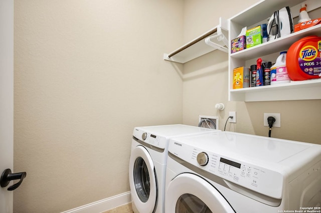 laundry area with washer and clothes dryer