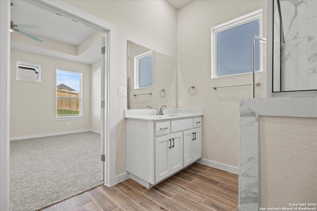 bathroom featuring vanity and ceiling fan