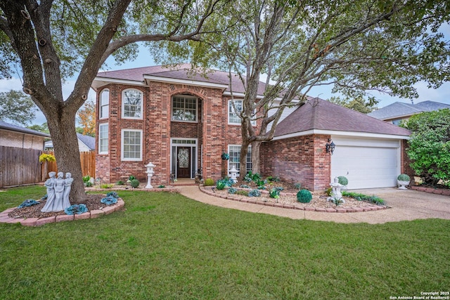 view of front of property with a garage and a front yard