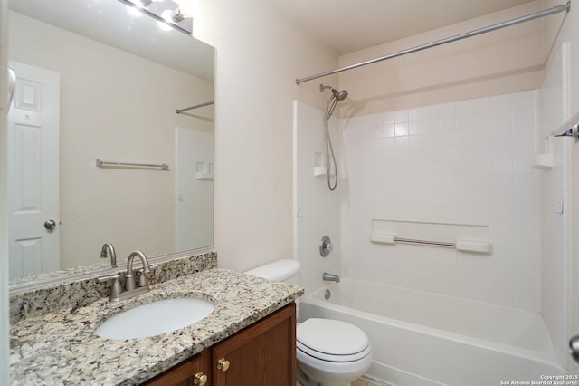 full bathroom with toilet, vanity, and shower / bath combination