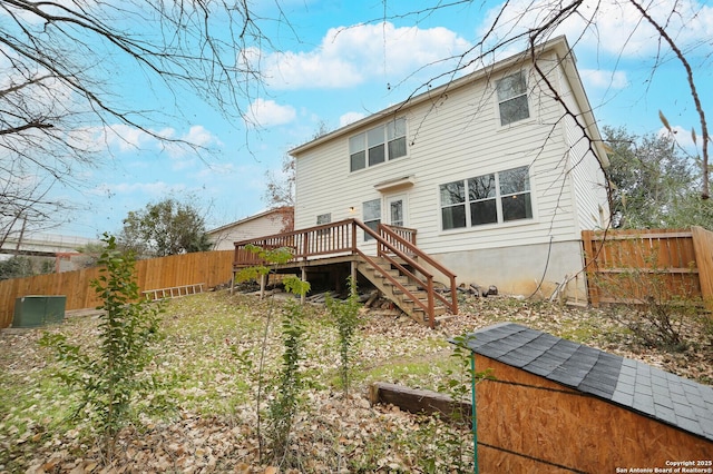 rear view of house with a deck