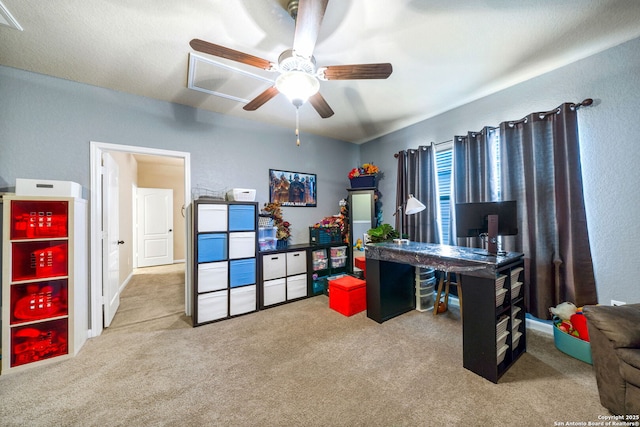 home office featuring ceiling fan and carpet