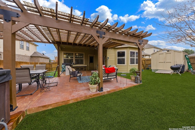 view of patio with a storage shed and a pergola