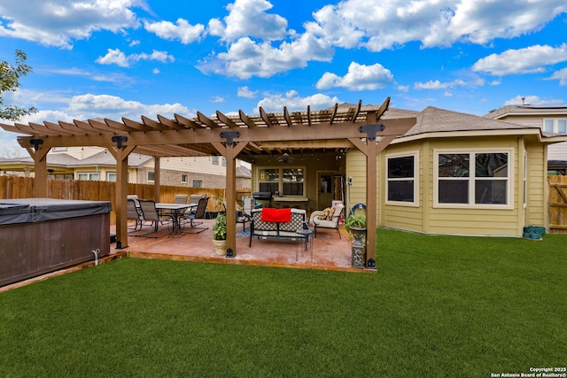 back of property featuring a patio area, a hot tub, a pergola, and a yard