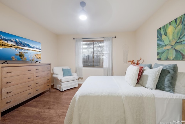 bedroom featuring dark hardwood / wood-style floors