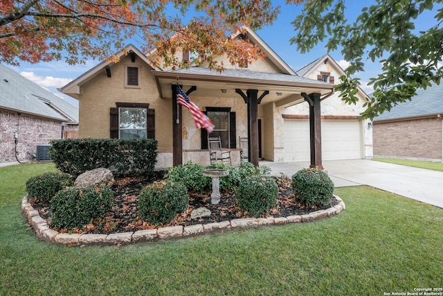 view of front of house featuring a garage, a porch, cooling unit, and a front lawn