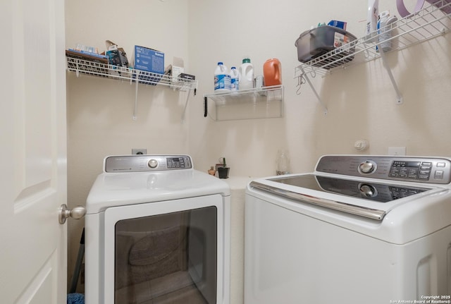 laundry area featuring separate washer and dryer