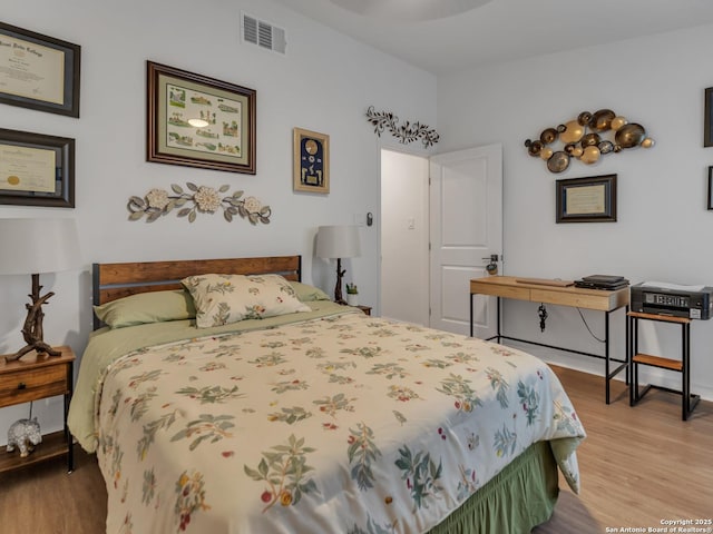 bedroom featuring light hardwood / wood-style flooring