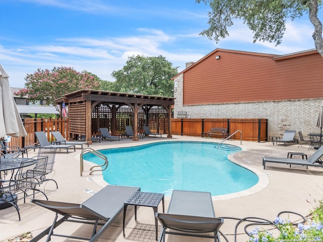 view of pool featuring a patio area and a gazebo