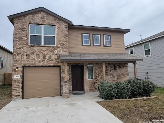 front of property with a garage