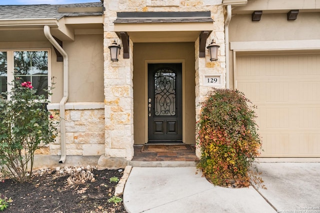 entrance to property with a garage