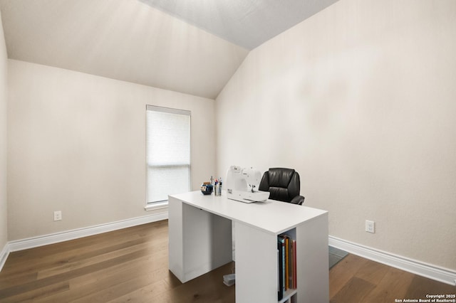 office space featuring dark wood-type flooring and lofted ceiling