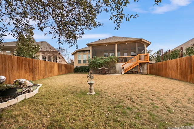 view of yard featuring a sunroom