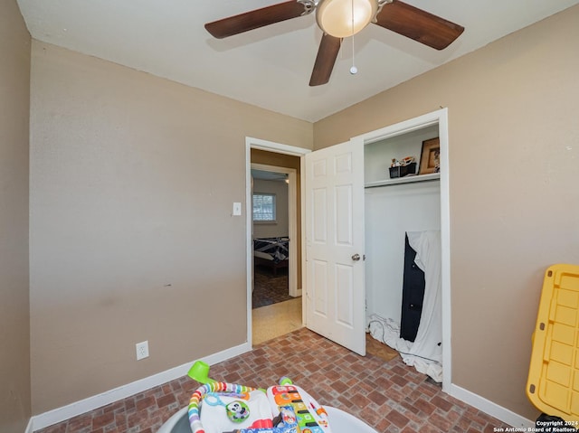 recreation room with ceiling fan