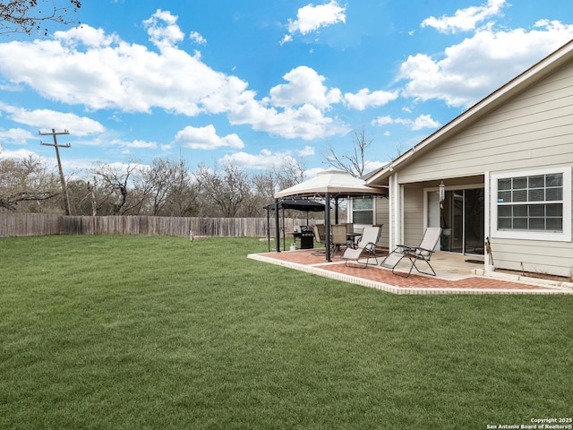 view of yard featuring a patio area and a gazebo