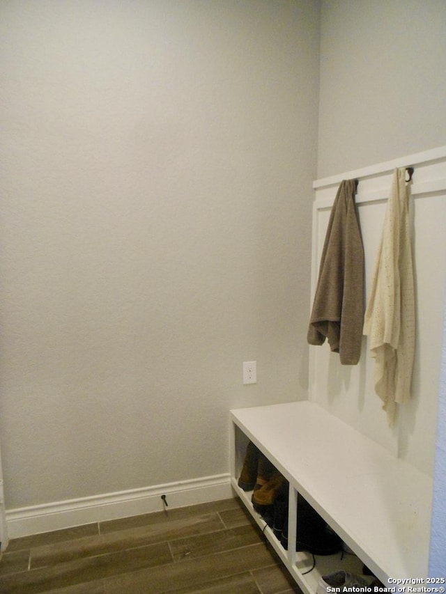 mudroom featuring dark wood-type flooring