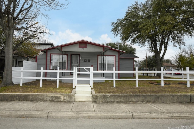 view of front of property with a fenced front yard