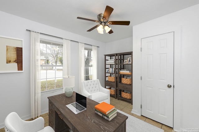 tiled office featuring ceiling fan and plenty of natural light