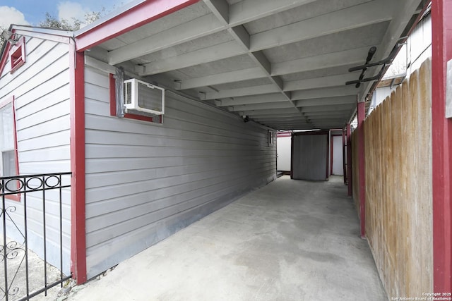 exterior space with cooling unit and a carport