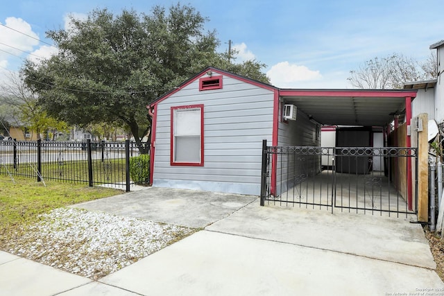 garage featuring a carport