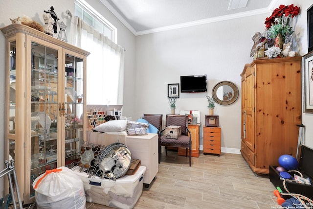 interior space with crown molding