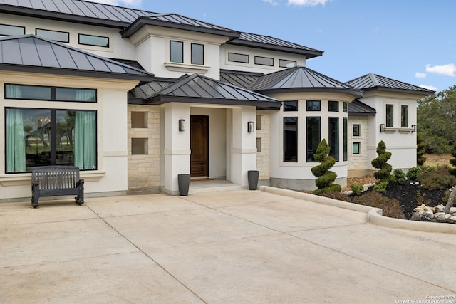 view of front facade with a patio area