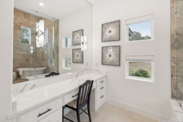 bathroom with vanity, tile patterned flooring, and separate shower and tub