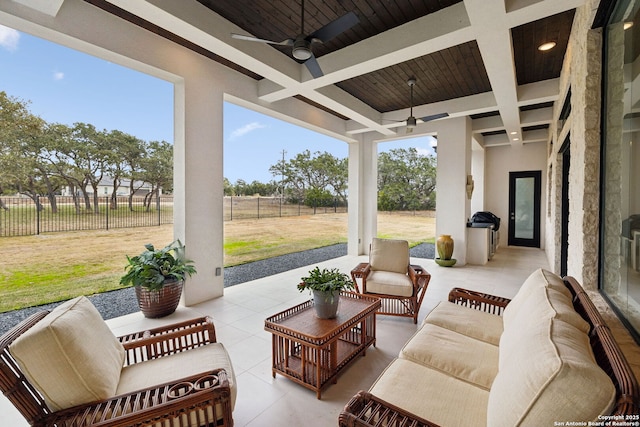 view of patio / terrace with area for grilling, ceiling fan, and outdoor lounge area