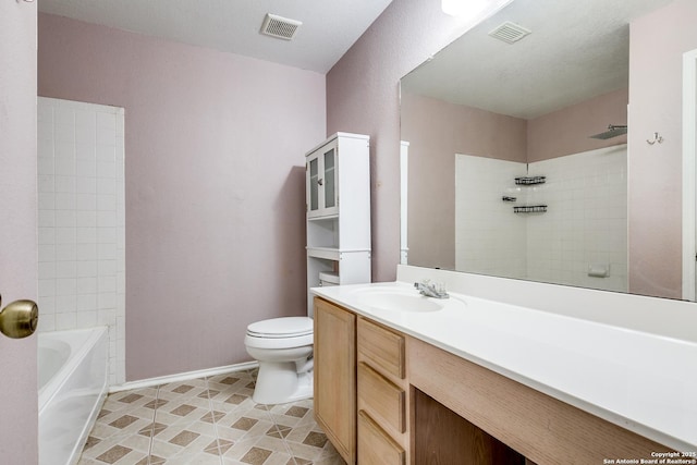 full bathroom with toilet, tiled shower / bath, and vanity