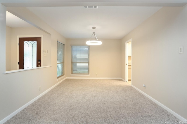 view of carpeted spare room