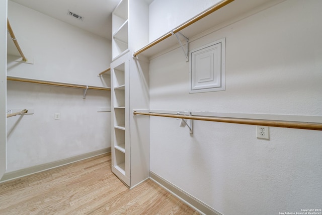 spacious closet with light wood-type flooring