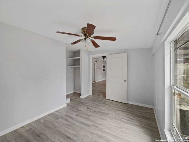 spare room featuring light wood-type flooring