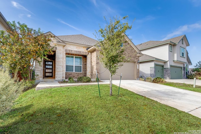 view of front facade with a front lawn and a garage