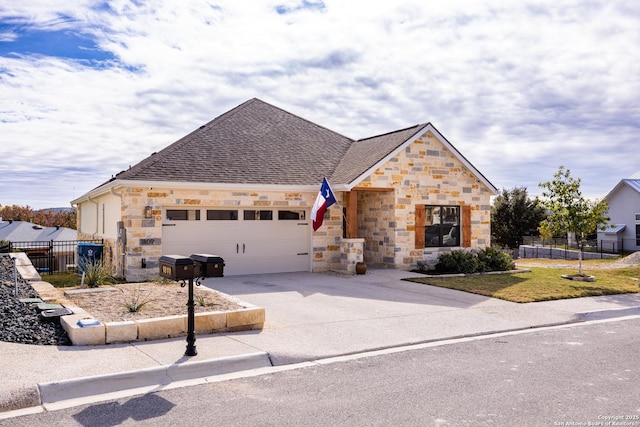 view of front of property with a garage