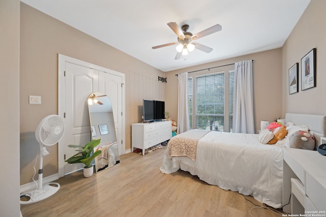 bedroom featuring ceiling fan and light hardwood / wood-style flooring