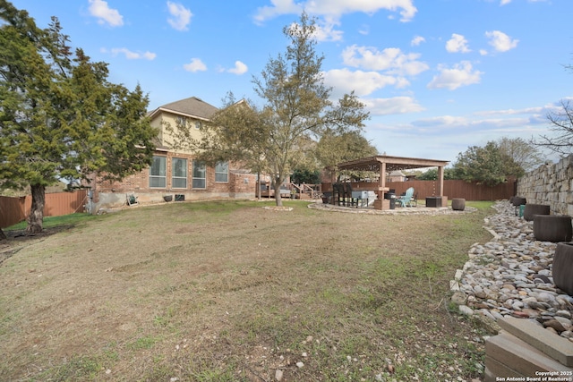 view of yard featuring a gazebo and a patio area