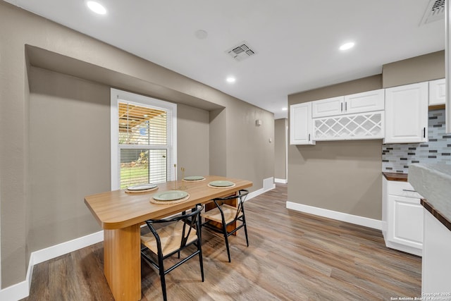 dining room with light hardwood / wood-style floors