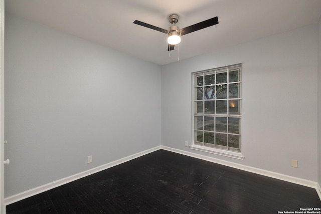 unfurnished room featuring hardwood / wood-style flooring and ceiling fan